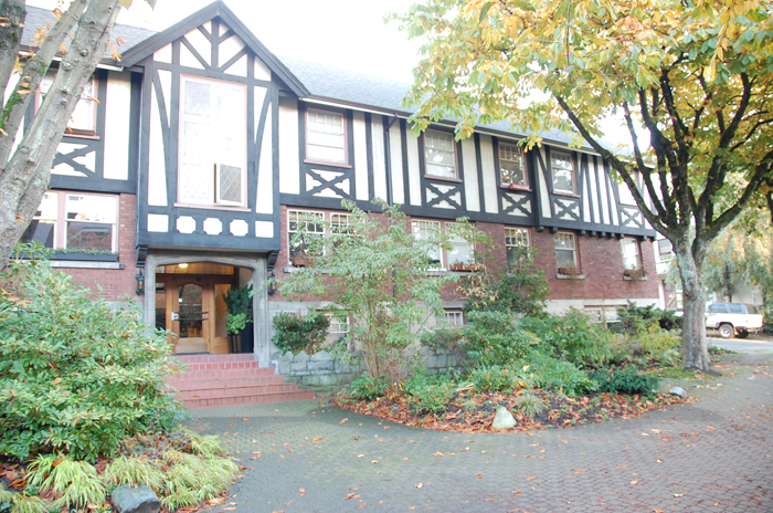 Beaufort Mansions — a Tudor-style heritage building at 1160 Nicola Street